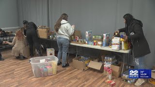 AIC Mens Baseball team donates large amounts of food to Square One Lorraines Soup Kitchen and Pan [upl. by Yarrum905]