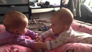 Twin babies talk and hold hands for the first time [upl. by Aitret]