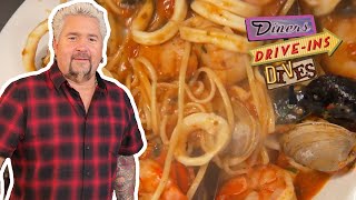 Guy Fieri Eats the quotSeafood Buffet for 90quot in Baltimore  Diners DriveIns and Dives  Food Network [upl. by Akiret]