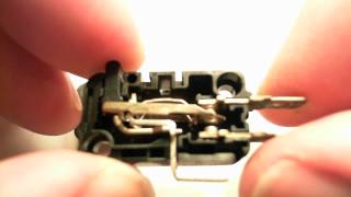 Inside a microswitch showing its operation in HD [upl. by Keener]