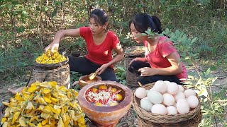 Adventure in forest Cooking egg with Sesbania flower very delicious food for dinner [upl. by Etterual739]