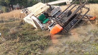 kubota Harvester Stuck in Deep Mud  Pulling by one other harvester [upl. by Myers]