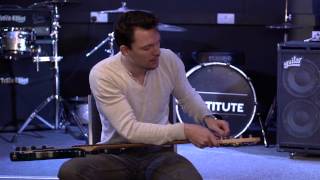 Restringing a bass guitar  How to play bass guitar lesson one [upl. by Anaik748]