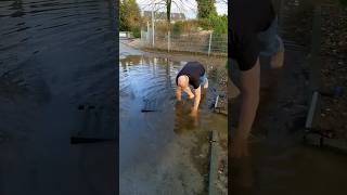 S0142 Unclogging a storm drain on a playing area in Germany shorts [upl. by Schram]