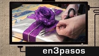 Cómo envolver un regalo de Navidad [upl. by Birdt]