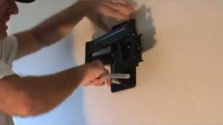 Mounting a tv wall bracket [upl. by Nnairek]