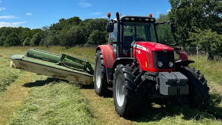 Massey Ferguson 5480 mowing silage [upl. by Hermosa954]