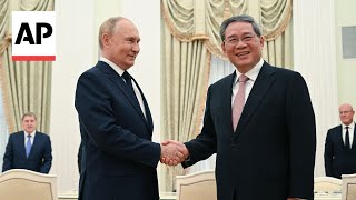 Putin meets Chinas Premier Li Qiang in Moscow [upl. by Docila571]