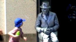 Hilarious living statue scared young boy [upl. by Aehsan793]