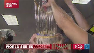 Texas Rangers give the Commissioners Trophy a champagne shower after winning 2023 World Series [upl. by Litman343]