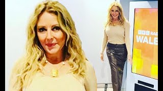 Carol Vorderman 62 looks ravishing in a tightfitting leather skirt as she shows off her curves [upl. by Gigi82]