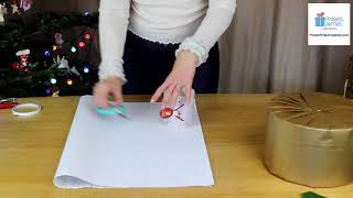 Christmas gift wrapping how to gift wrap a round box [upl. by Ettebab]