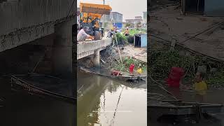 Use A Loader To Lift And Refloat A Boat Sunk To The River Bottom By Downpour [upl. by Larsen363]