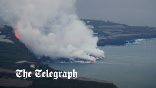 La Palma volcano lava hits the sea as residents warned about toxic gases [upl. by Aivun]