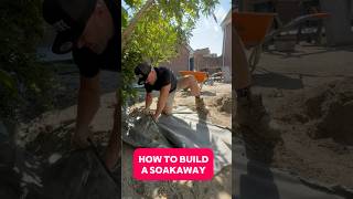 We built a soakaway to stop water buildup landscaping diy construction [upl. by Sirrep]