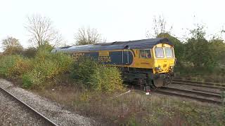 66704Running round 6D21Roxby GuiltDoncaster spoil waggons Barnetby [upl. by Allerbag]