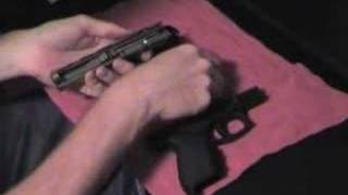 Field Stripping a Taurus PT247 Pro [upl. by Enahc]