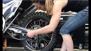 Basic dirt bike maintenance Howto remove and install rear wheel [upl. by Jemmie348]