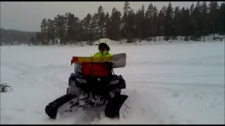 Suzuki King quad 750 4x4 ATV with Camoplast tatou 4s snow tracks kit belter 4 four wheeler [upl. by Aicina146]