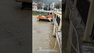 Process Of An Excavator Passing Under A Bridge [upl. by Yrovi]