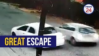 WATCH Motorist escapes hijacking reverses into assailants car [upl. by Hubsher483]