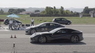 Tesla Model S P100D vs Ferrari F12 14 Mile Drag Race [upl. by Adlaremse570]