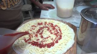 Frank Giaquinto Master PIzza Maker Opening a NY style dough ball with oil Part 1 [upl. by Yeltsew]