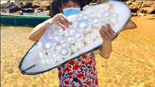 Perfect Catch giant white pearl oysters and find the perfect pearl [upl. by Winwaloe]