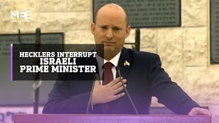 Israeli prime minister heckled during Memorial Day event [upl. by Salkcin]