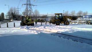 Forklift stuck in snow Snow plow fail being towed by JCB [upl. by Ibib]