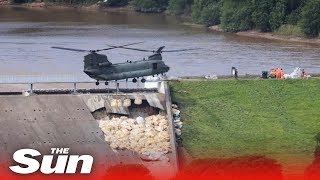 RAF Chinook assists Derbyshire Police in race against time to shore up Toddbrook reservoir dam [upl. by Eseneg]