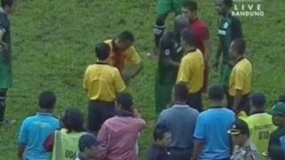 Indonesian football player draws blood after punching referee [upl. by Johns]