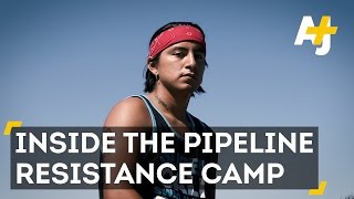 Native American Resistance Camp Fights Oil Pipeline [upl. by Kussell]