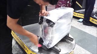 How To Wrap Luggage For Airplane [upl. by Rudyard10]