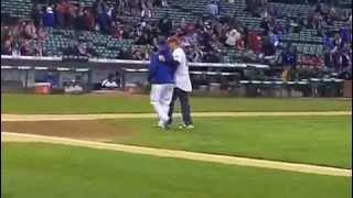 Head Coach Porter Moser Throws Cubs First Pitch [upl. by Arayt]