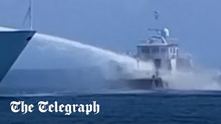 Chinese ships fire water cannons on Philippine resupply vessels in South China Sea [upl. by Kurys]