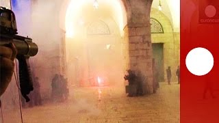 Stones smoke in Al Aqsa mosque Israeli forces clash with Palestinians  police footage [upl. by Meece867]