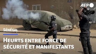 Sénégal  affrontements entre manifestants et forces de sécurité à Dakar  AFP Images [upl. by Ecilahs385]