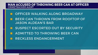 Man charged with throwing beer can at officer on Broadway [upl. by Barncard]