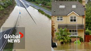 UK flooding Heavy rains inundate parts of Britain wash out roads [upl. by Cheryl]