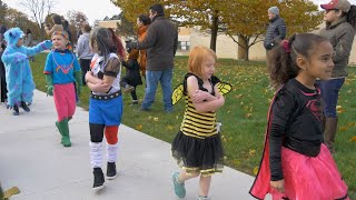 Children Brave the Michigan Cold at the Halloween Parade [upl. by Tisbee]