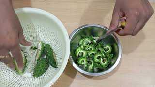 cutting bitter gourd for cooking [upl. by Assennev]