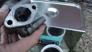 Ultrasonic cleaner cleaning a EGR valve [upl. by Sebastiano]