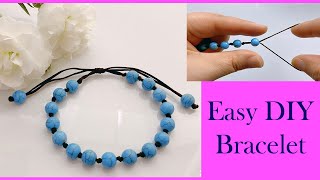 Friendship bracelet  How to make a bracelet Beads Charm Cord Thread String Good Luck Bracelet [upl. by Rellim]