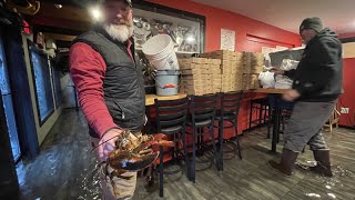 Lobsters and crabs come out to play in flooded Maine restaurant [upl. by Bearnard]