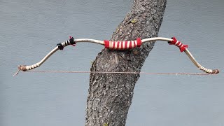 Native American horn bow with rawhide backed [upl. by Lynnelle376]