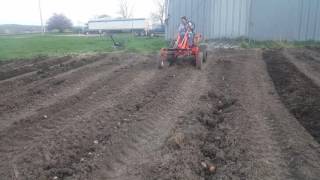 Hilling potatoes with a TuffBilt Tractor [upl. by Trocki]