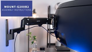 MOUNTG200B2 Pneumatic Dual Monitor Wall Mount Assembly by VIVO [upl. by Riaj]