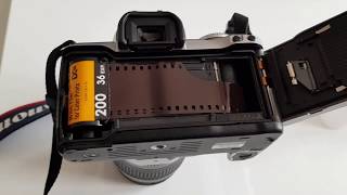 Loading 35mm film into eos 300v or any auto loading camera [upl. by Elocon253]