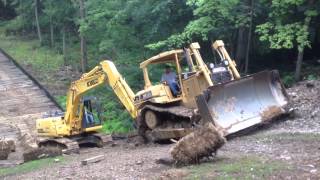 Steep slippery slope for a dozer and excavator [upl. by Ardnasak]